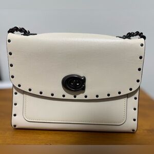 Cream Leather Shoulder Bag with Black Studs. Can be worn as crossbody